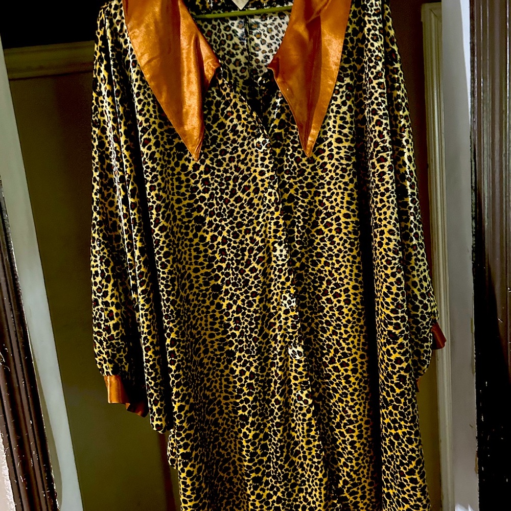 Two piece cape and satin skirt set.